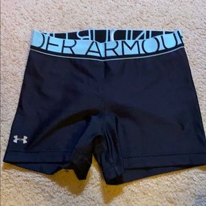 Black under armor spandex shorts.